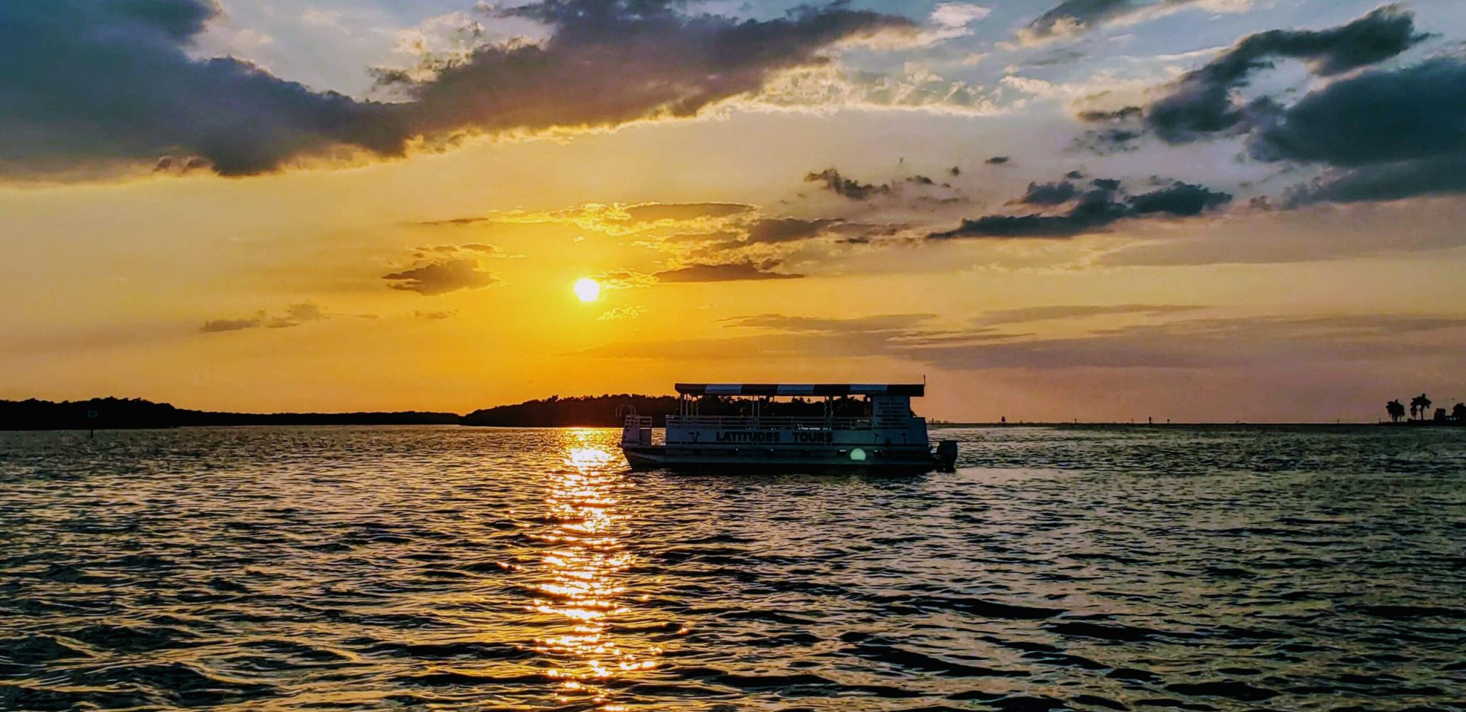 a sunset over a body of water